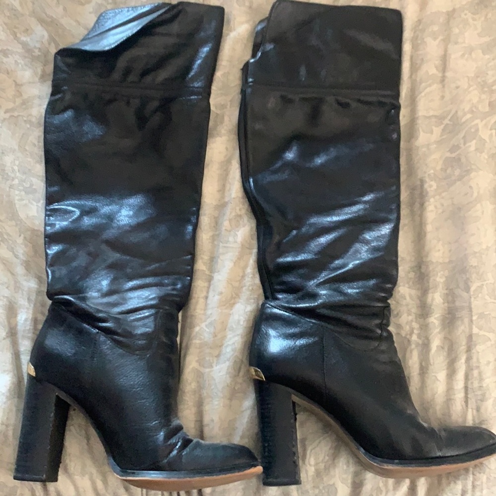 Over the knee black leather boots